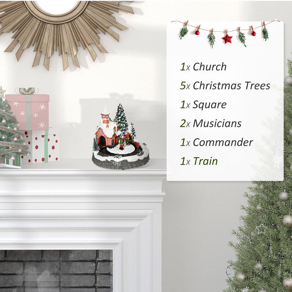 Christmas houses with multi-colored rotating train