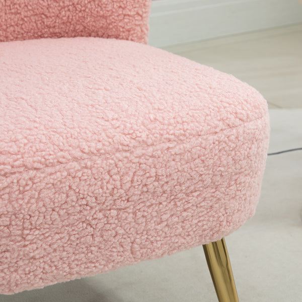 Living room armchair with soft padding and gold legs, pink