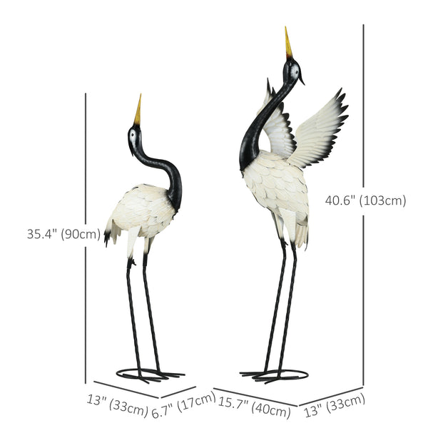 Set of 2 heron statues, white and black