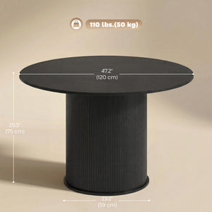 Round black dining table for 5 with fluted central pedestal.