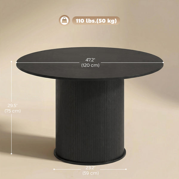 Round black dining table for 5 with fluted central pedestal.