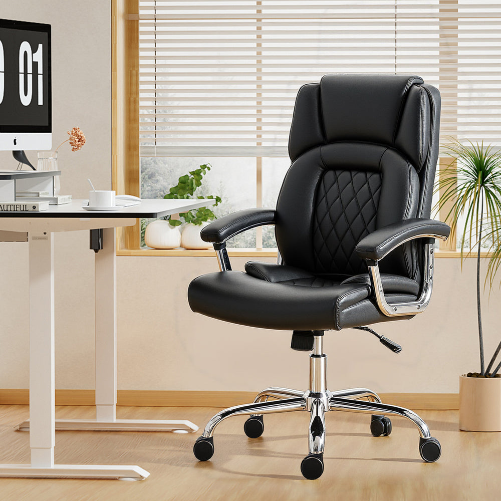 Office chair with spring cushion, faux leather upholstery, black.