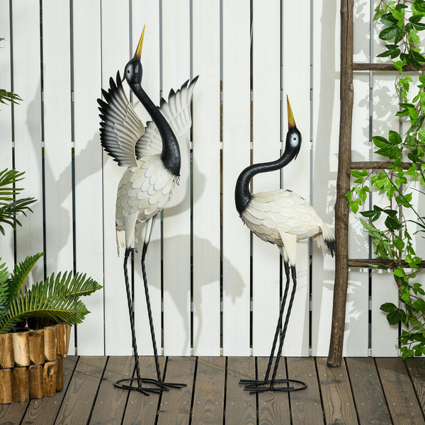 Set of 2 heron statues, white and black