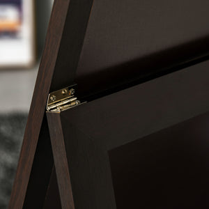 Brown framed mirror on stand