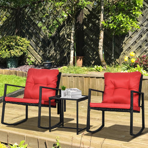3-piece bistro set in woven resin with coffee table and rocking chairs, red