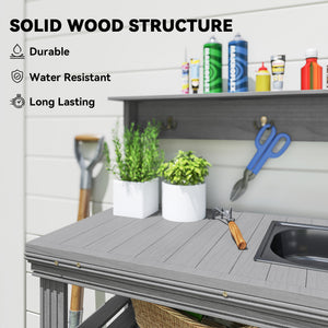 Outdoor potting table with tap, removable sink, hooks and storage shelves