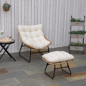 Rattan armchair with footrest