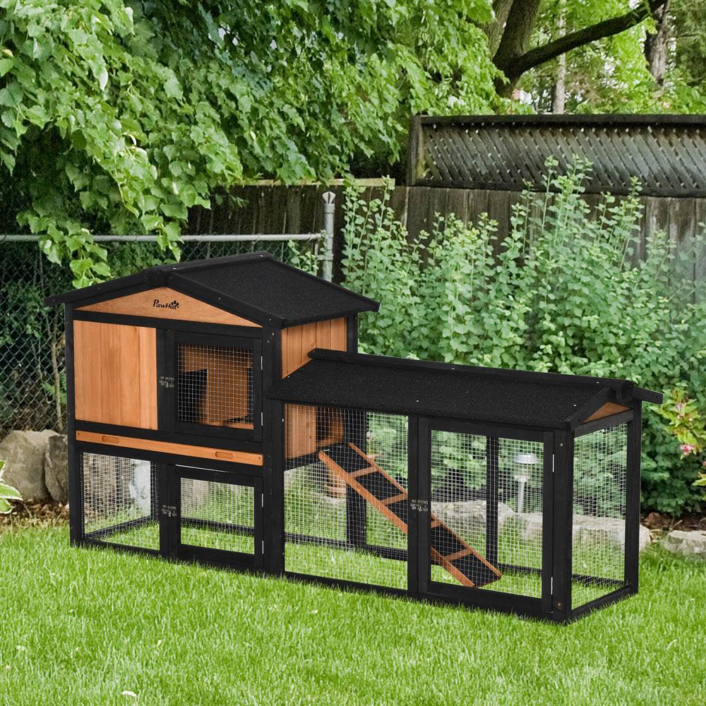 Wooden hutch with run, a playpen, a pull-out tray and a ramp
