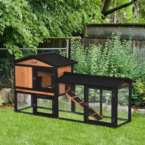 Wooden hutch with run, a playpen, a pull-out tray and a ramp