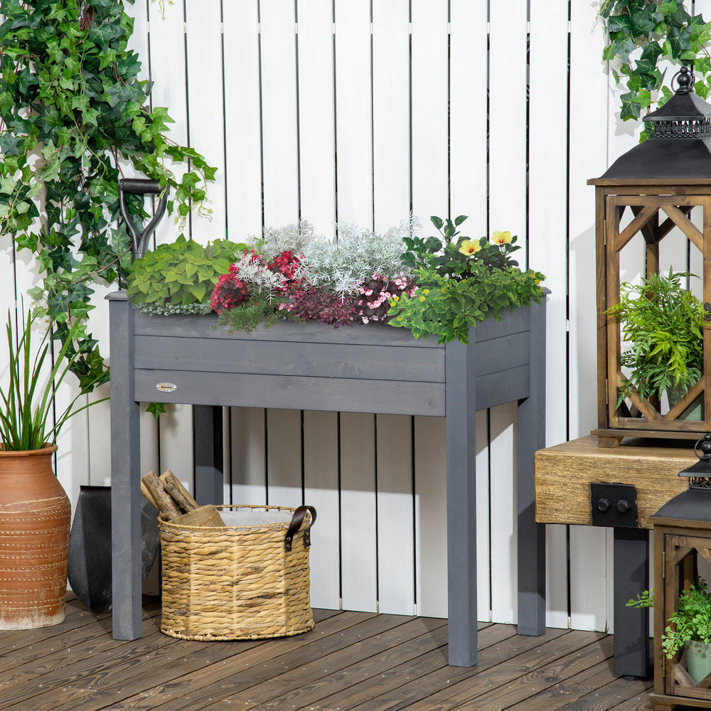 Raised wooden planter with legs, drainage holes and inner bag, dark grey
