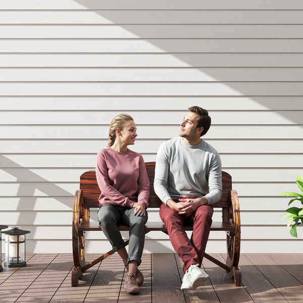 Two-seater wooden outdoor bench with wagon wheel shaped armrests