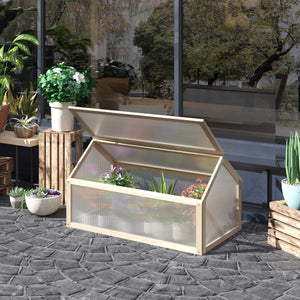 Portable raised garden greenhouse made of natural wood with a hinged lid