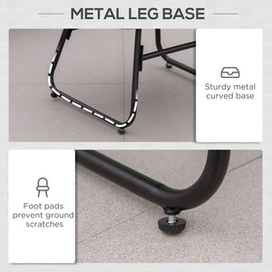 Rattan armchair with footrest