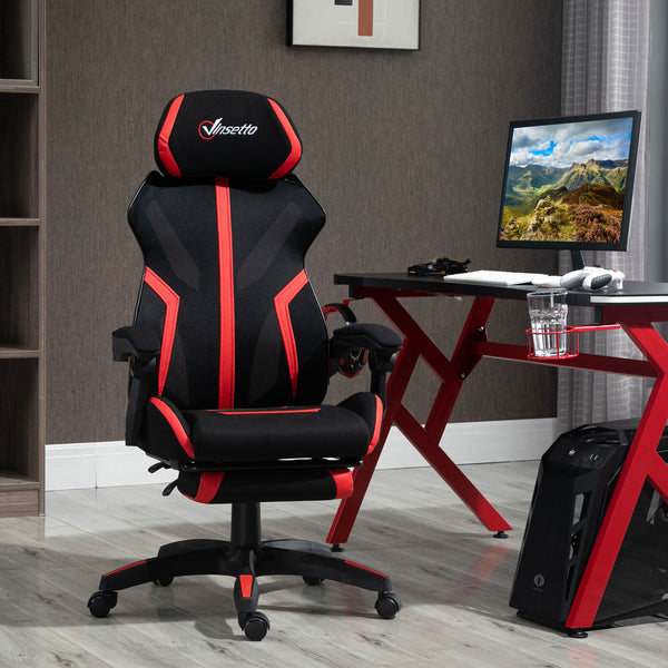 Ergonomic gaming chair with footrest, black and red.