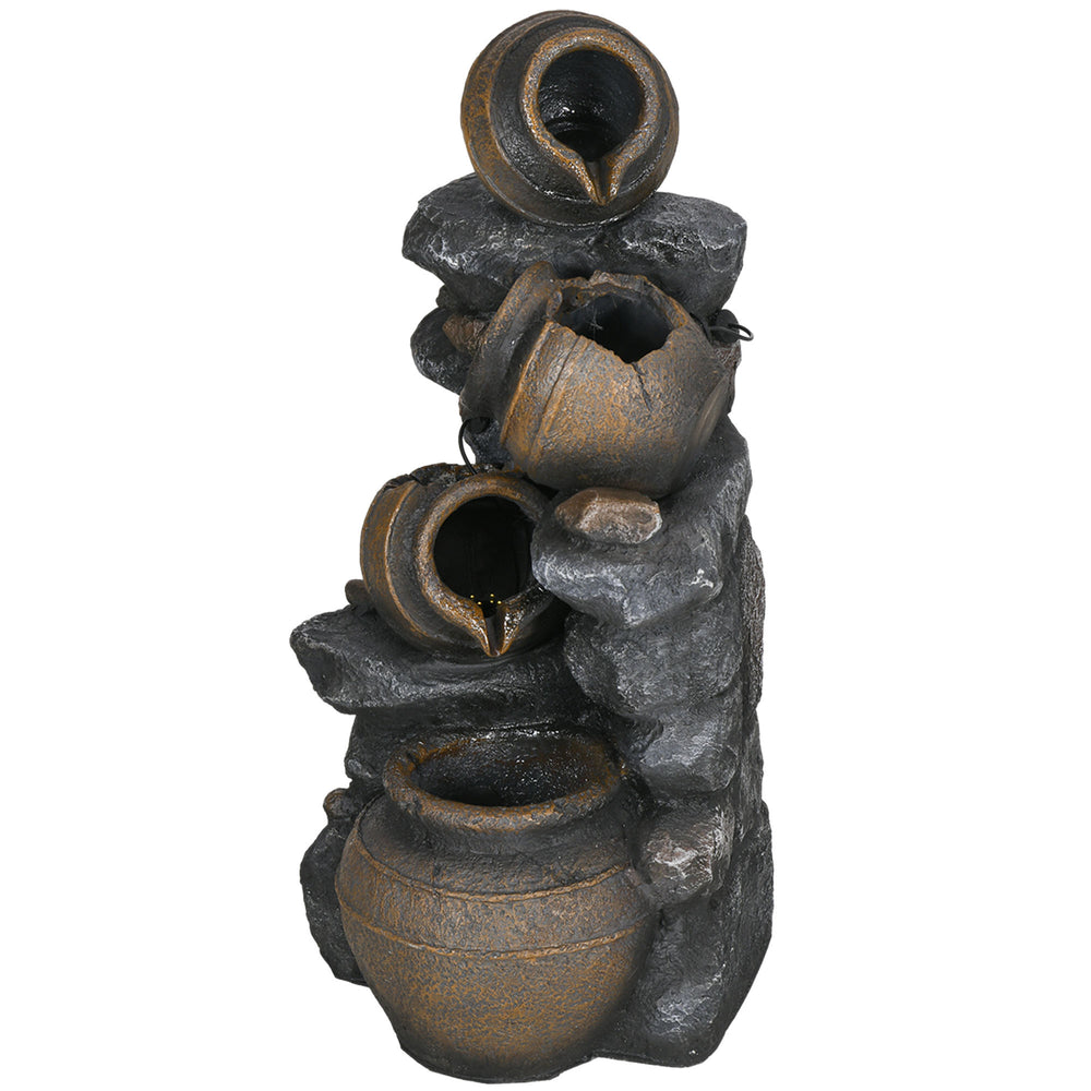 Solar fountain, 4-tier resin waterfall and stacked stones, with LED lighting.