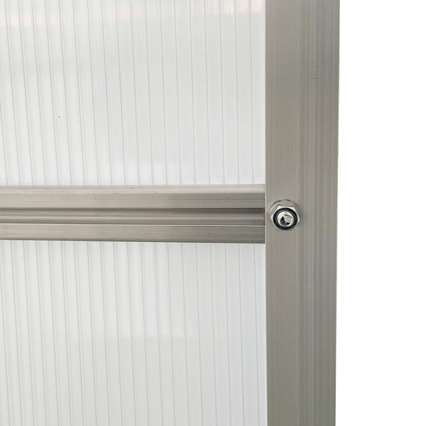 Polycarbonate greenhouse with adjustable roof ventilation and sliding door, transparent