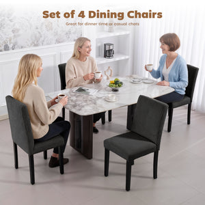 Set of 4 dining chairs with rubberwood legs and padded seats, black