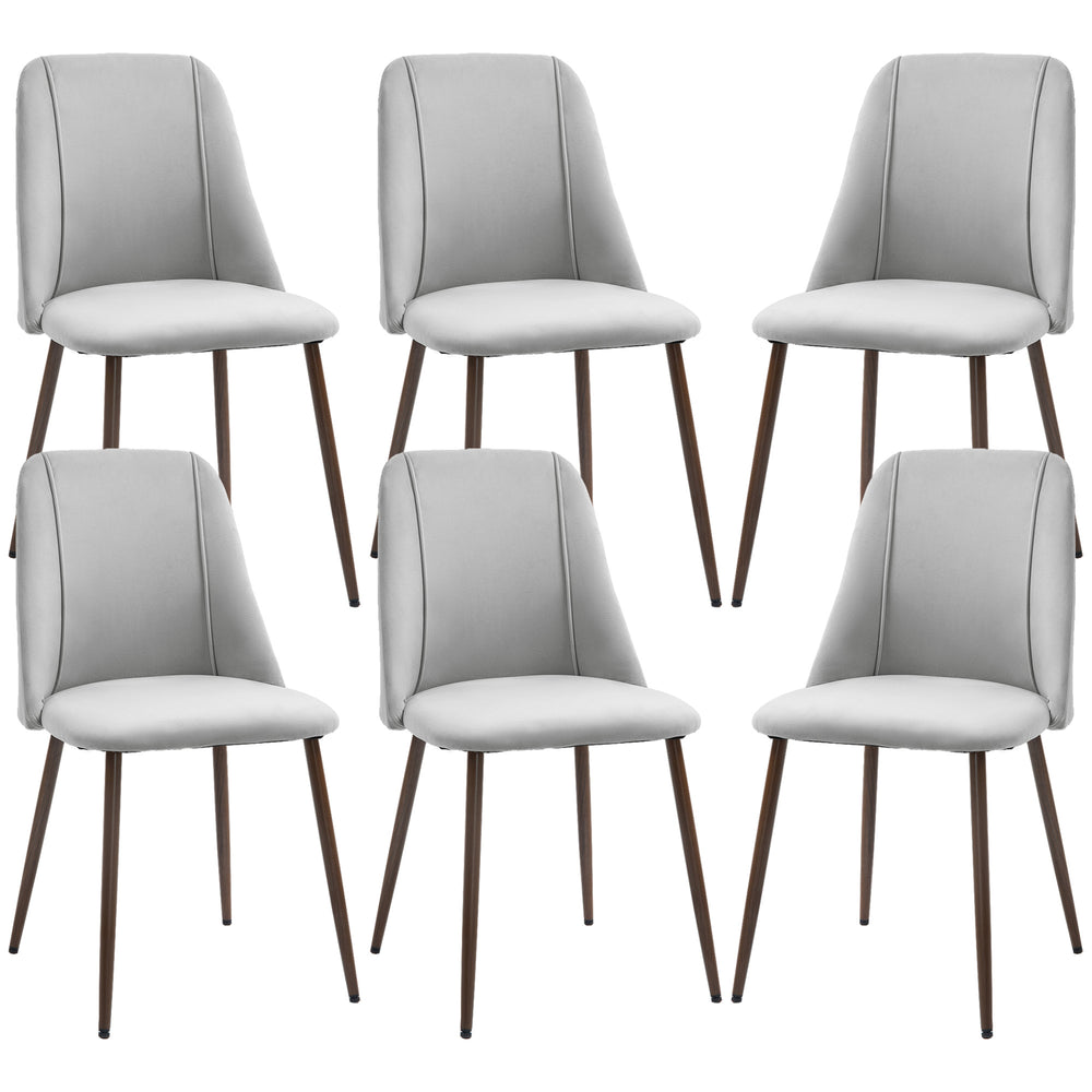 Lot de 6 chaises de salle à manger rembourrées en velours gris avec dossier incurvé et pieds en acier imitation bois, idéales pour une cuisine ou une salle à manger moderne et élégante