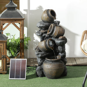 Solar fountain, 4-tier resin waterfall and stacked stones, with LED lighting.