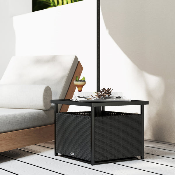Outdoor coffee table in woven rattan with a hole for a parasol, black