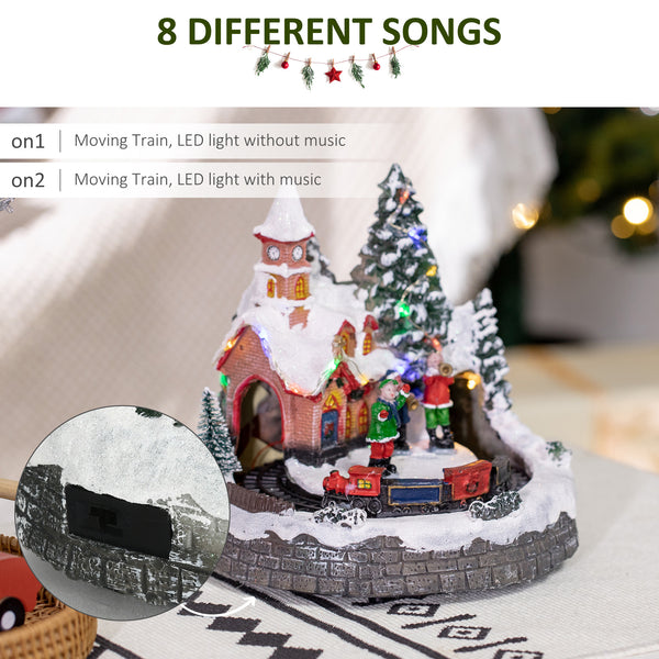 Christmas houses with multi-colored rotating train
