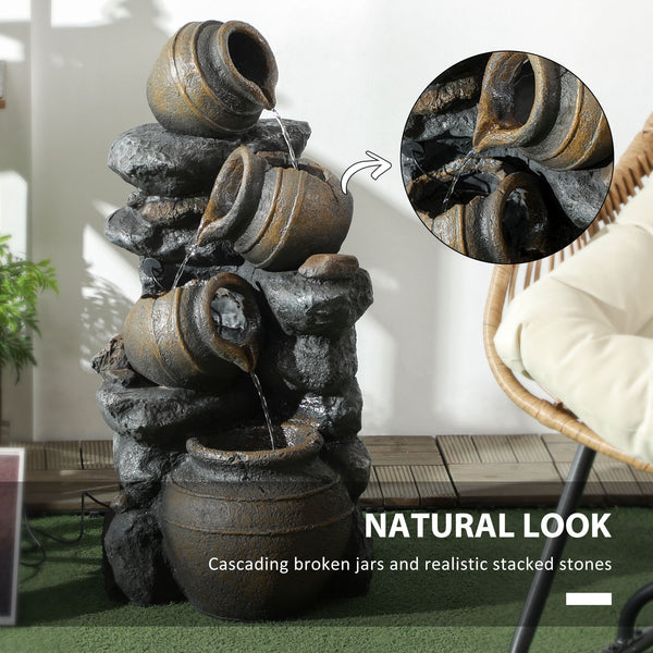 Solar fountain, 4-tier resin waterfall and stacked stones, with LED lighting.