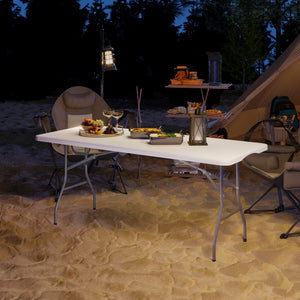 Portable folding plastic table with carrying handle