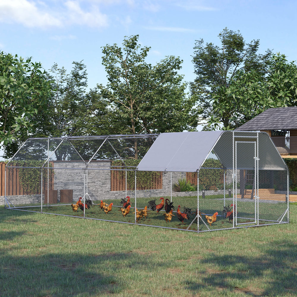 Galvanized metal chicken coop with flat roof and tarp