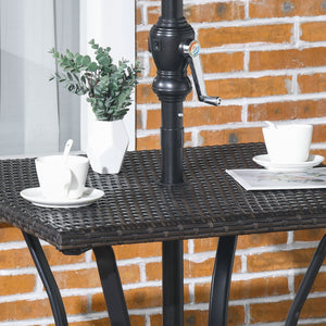 Outdoor coffee table in woven resin with a hole for a parasol, brown