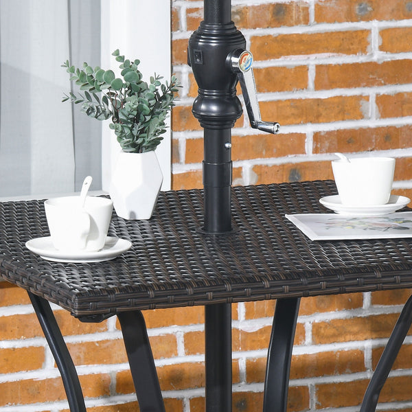 Outdoor coffee table in woven resin with a hole for a parasol, brown