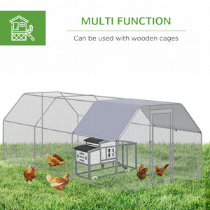 Large galvanized metal chicken coop with flat roof and tarp