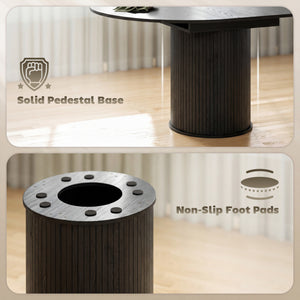 Extendable kitchen table for 6 to 8 people, farmhouse style, with a pedestal base and black wood finish.