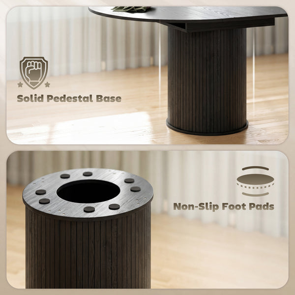 Extendable kitchen table for 6 to 8 people, farmhouse style, with a pedestal base and black wood finish.