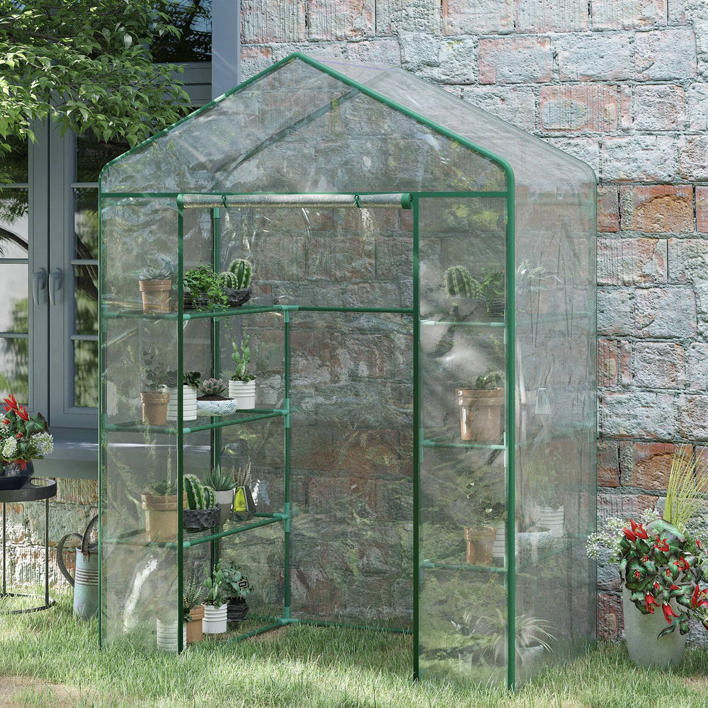 Serre de jardin légère et portable avec quatre étagères et une porte zippée enroulable, idéale pour cultiver en espace réduit
