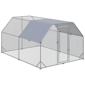Galvanized metal chicken coop with flat roof and tarp