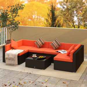 Modular 7-piece garden set in woven resin with coffee table, orange