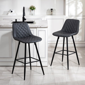 Set of 2 black faux leather bar stools.