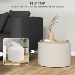 Round coffee table with hidden storage and linen upholstered top