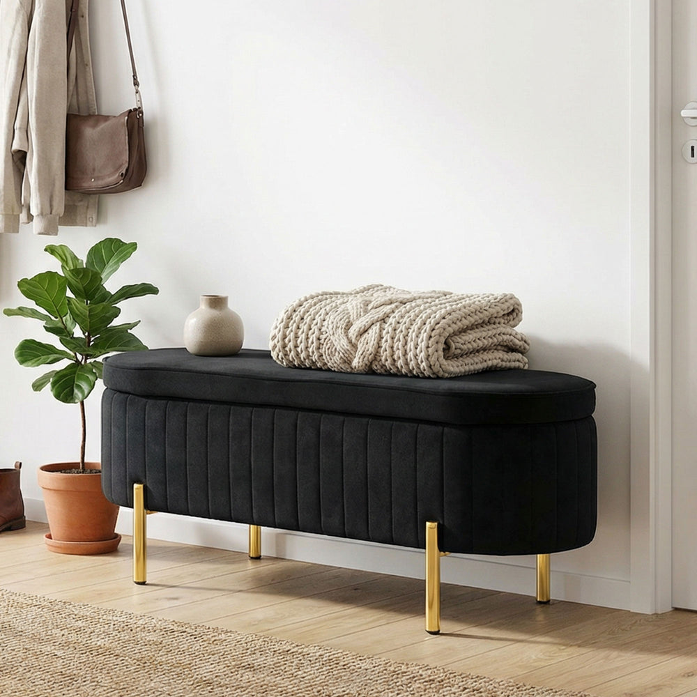 Upholstered bench with thick padding and metal legs, black