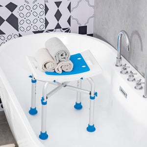 Height-adjustable shower chair with suction cup feet