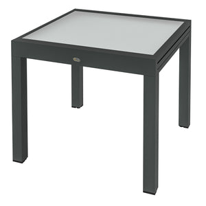 Extendable dining table in aluminum and tempered glass