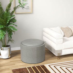 Round coffee table with hidden storage and gray linen upholstered top