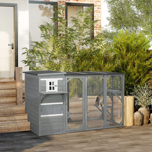 Wooden cat enclosure with asphalt roof and lockable doors, grey