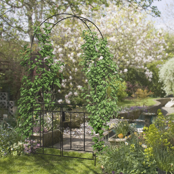 Metal garden arch with gate, trellis for climbing plants, black