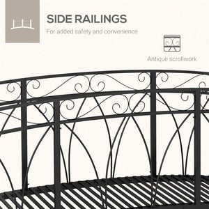 Metal garden walkway with railing and decorative scrolls, black