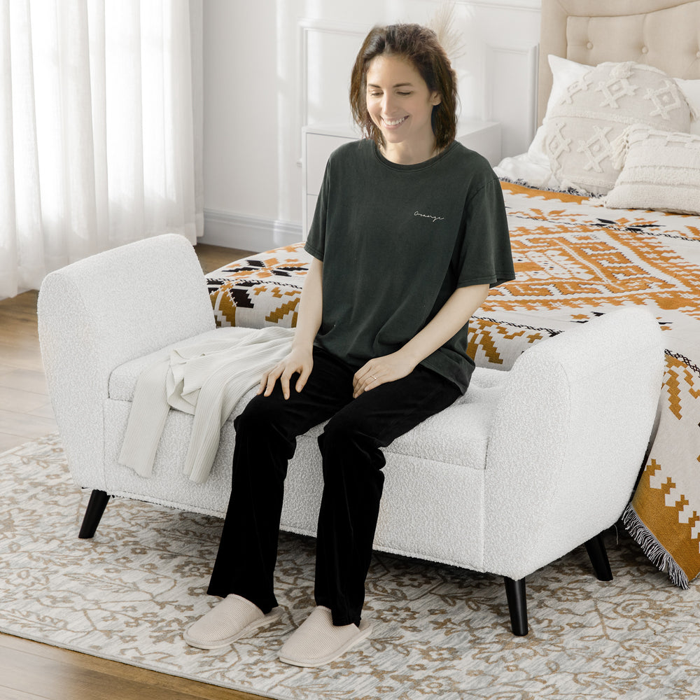 Upholstered storage bench with armrests, cream white