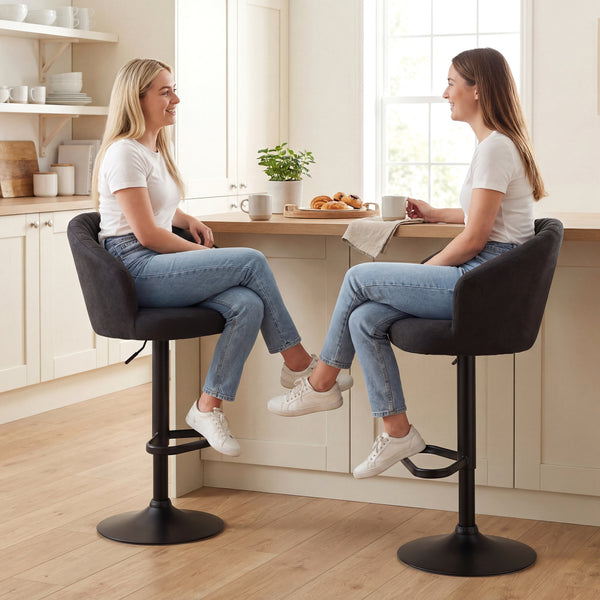 Set of 2 adjustable, padded bar stools with swivel seats, steel frame, footrest, black