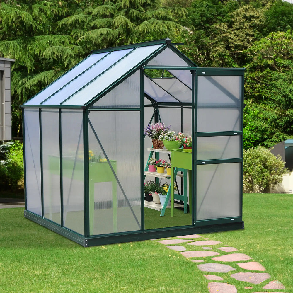 Serre de jardin avec panneaux en polycarbonate transparent et cadre en tôle galvanisée, équipée d’une porte coulissante pratique