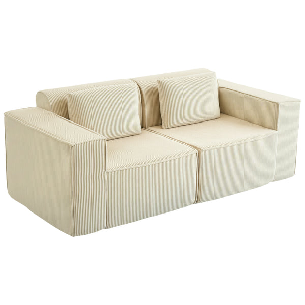 Three-seater corduroy sofa with deep seat, wide armrests, and two cushions, beige.