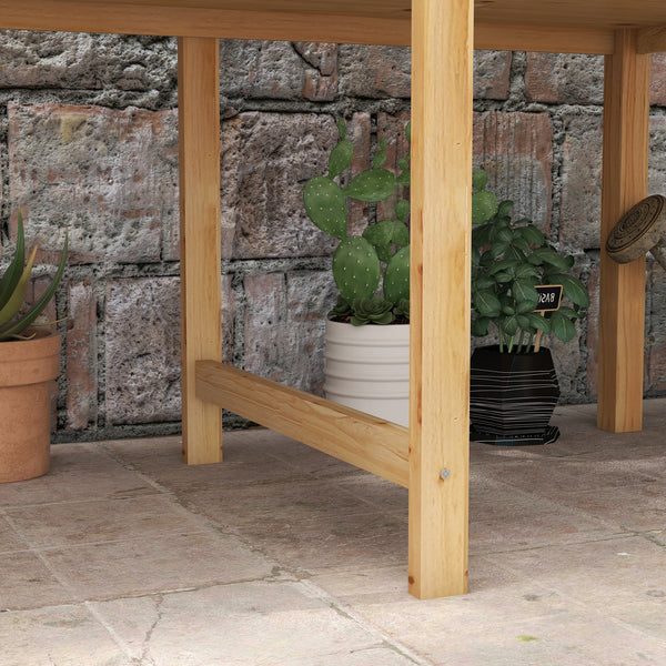 Raised wooden planter with drainage holes for vegetables, natural